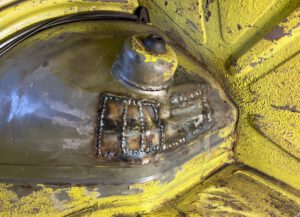 Welded rear wheel wells and shock towers